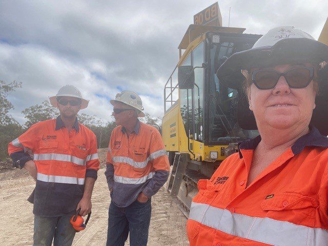 Candid photo of Sue, Peter, and Daniel Beardsell on site, Queensland's Trusted Drilling Specialists