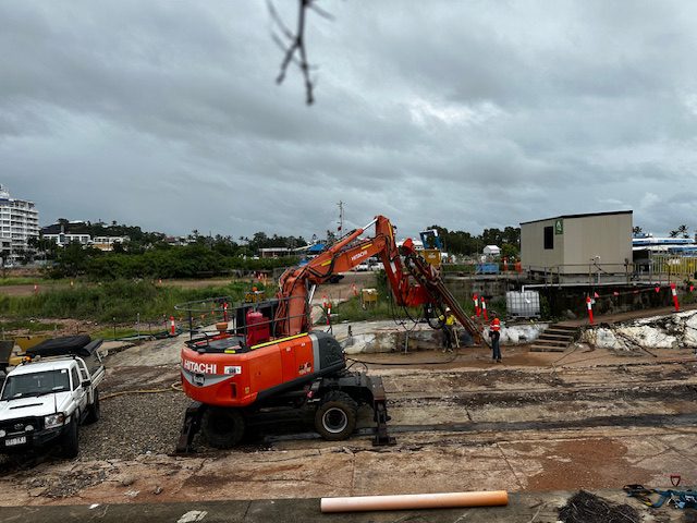 Hitachi drill rig in possition to begin anchorage drilling services at the Port of Townsville